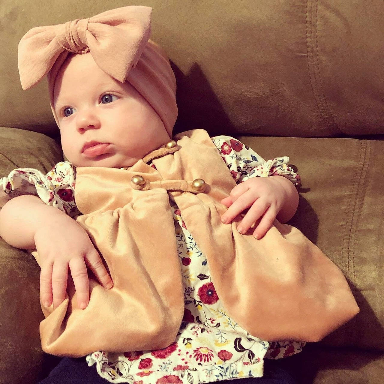 Joy is registered to the contest to win money with this photo: baby, beauty, beige, cheek, child, cool, ear, eye, fashion_accessory, finger, hair_accessory, hand, head, headgear, joint, lip, person, pink, product, skin