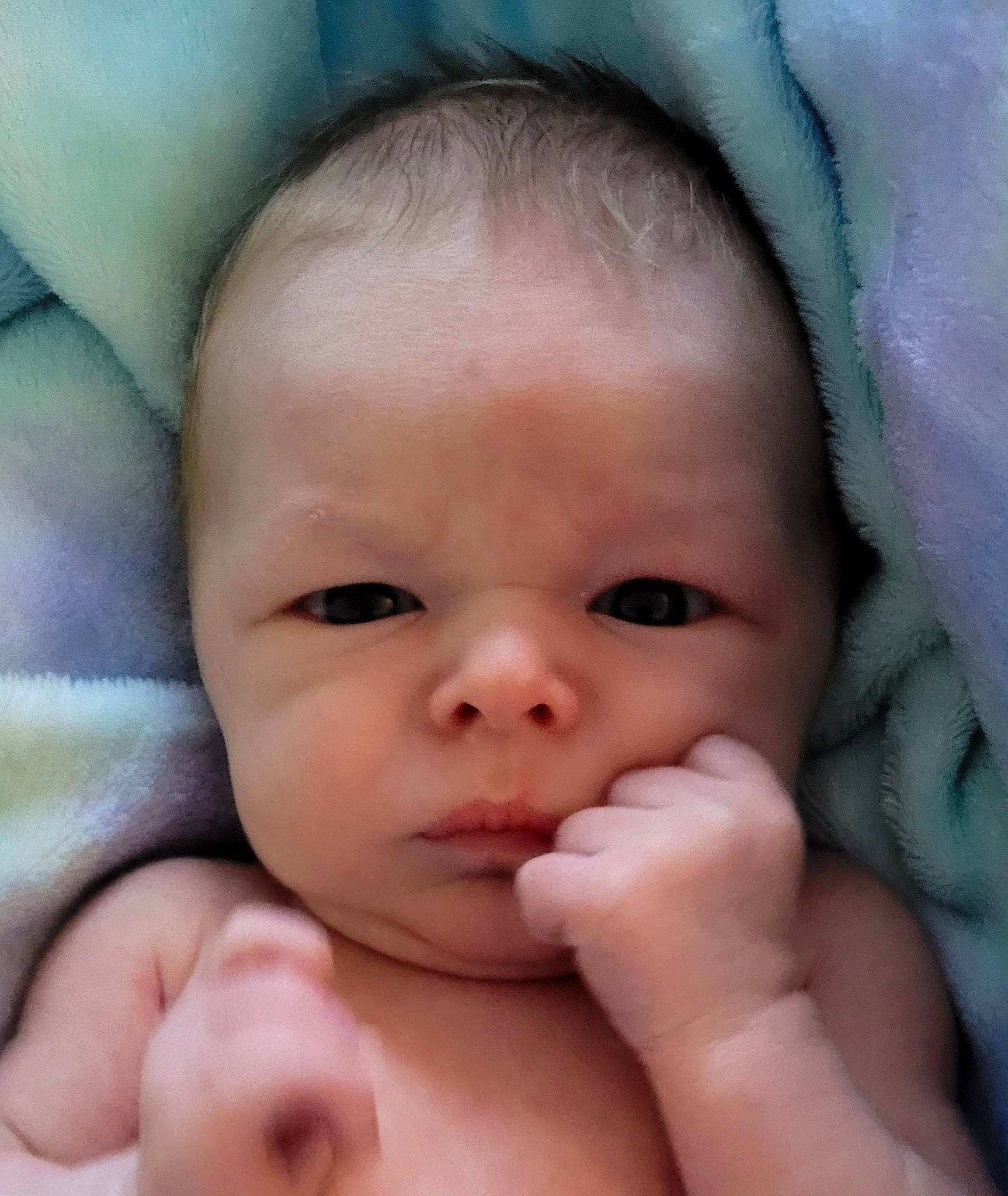 Lucas is registered to the contest to win money with this photo: azure, baby, cheek, chin, comfort, eye, eyebrow, eyelash, finger, gesture, hand, head, human_body, iris, lip, mouth, nose, person, photograph, product