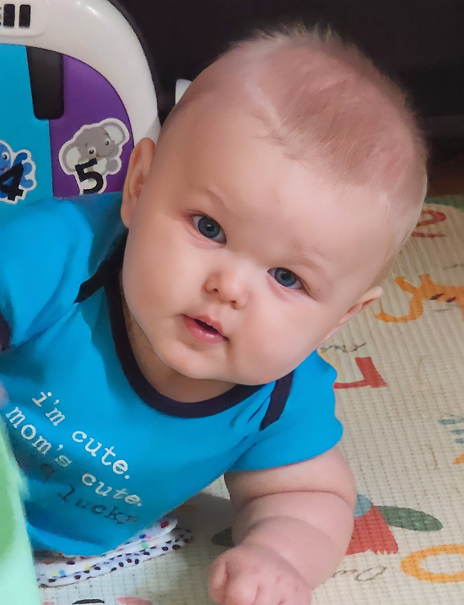 Lucas is registered to the contest to win money with this photo: azure, baby, baby_toddler_clothing, cheek, child, chin, facial_expression, finger, fun, hairstyle, happy, iris, mammal, mouth, nose, person, product, skin, sleeve, toddler