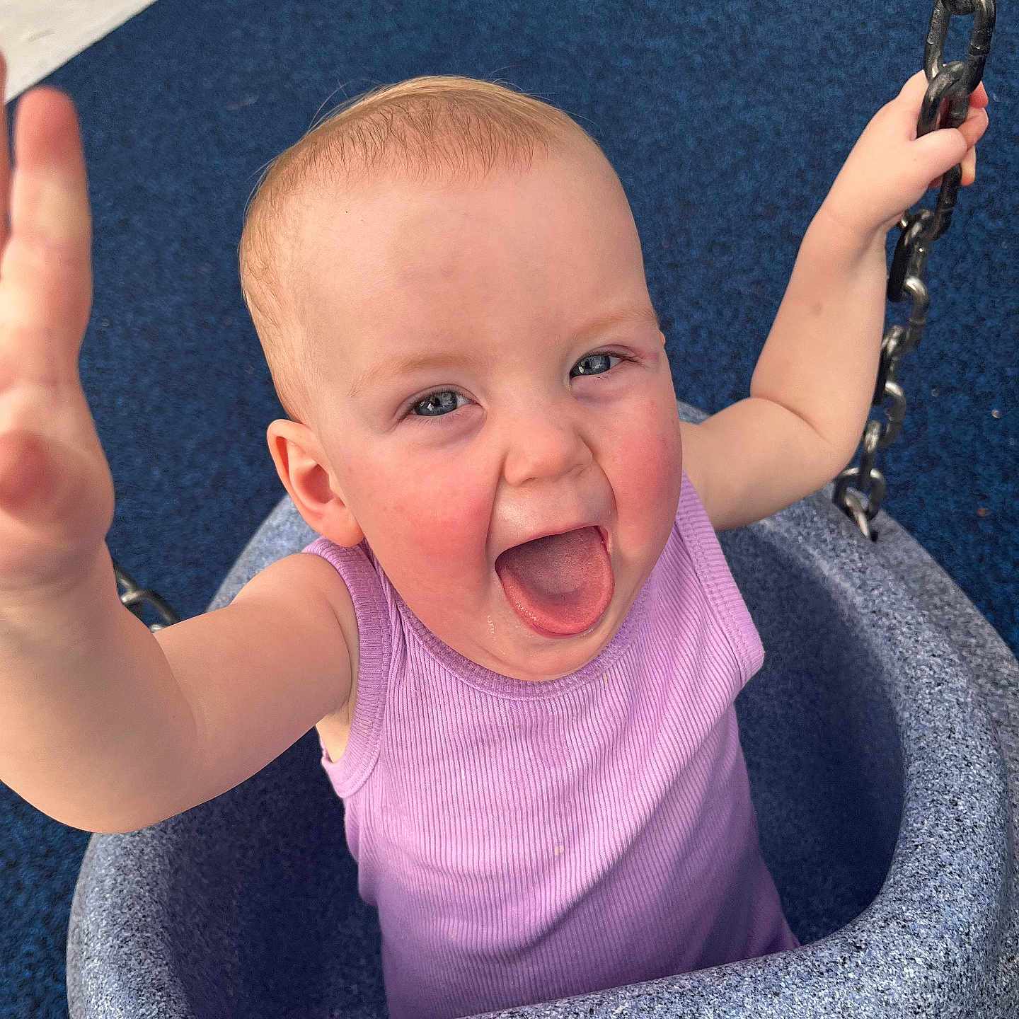 Analiese joined the competition — help win amazing prizes! active, baby, chain, child, cute, daylight, fun, happy, joyful, laughing, outdoor, person, play, playground, purple_tank_top, reaching, seat, smiling, swing, toddler