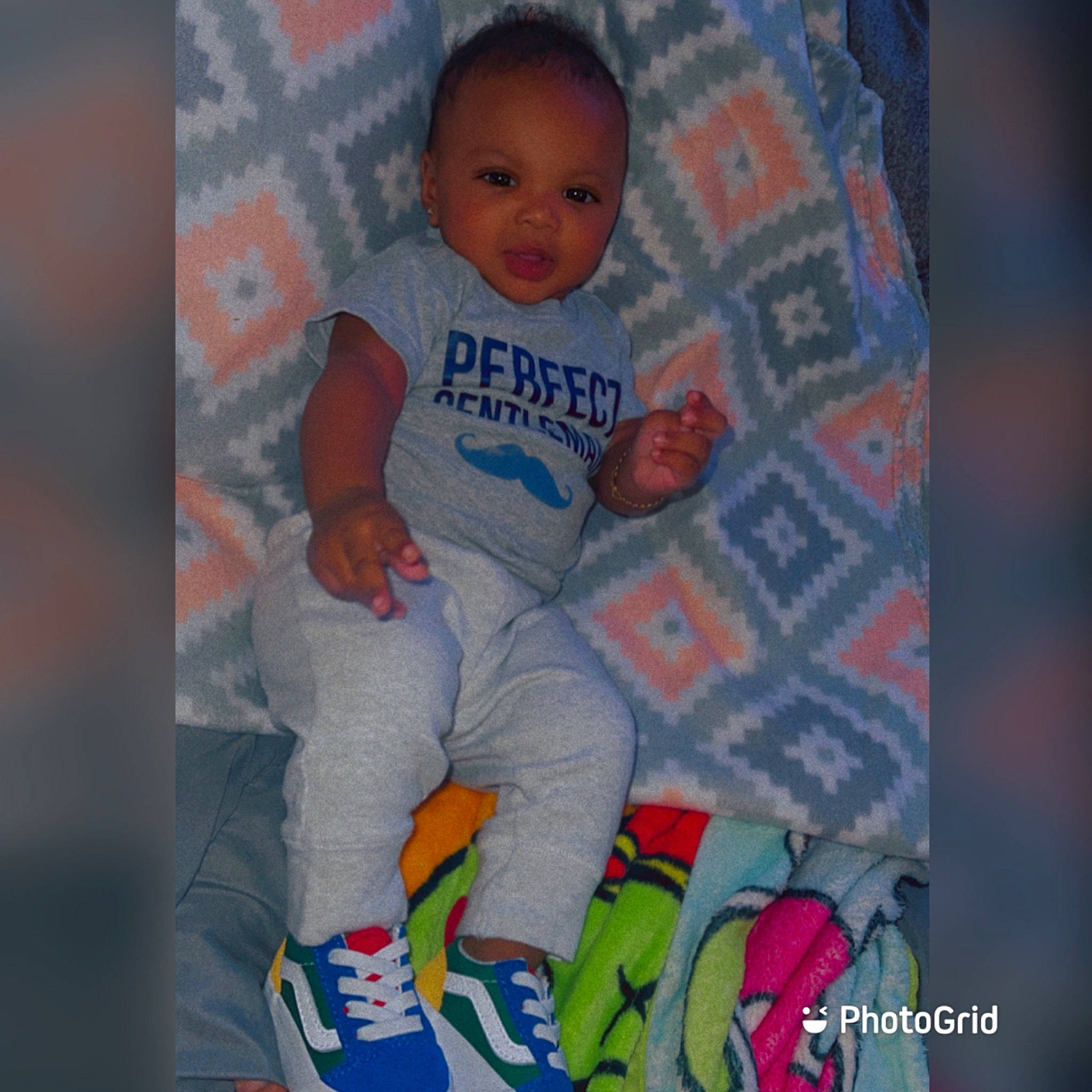 Kace is registered to the contest to win money with this photo: arm, baby, baby_products, baby_toddler_clothing, baby_toys, cheek, child, comfort, electric_blue, happy, linens, pattern, person, pink, product, sitting, sleeve, t_shirt, textile, toddler