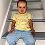 Raven participe au concours pour gagner de l'argent avec cette photo : blue_jeans, casual_clothing, child, cute, fashion, footwear, happy, indoor, person, portrait, sitting, smile, stairs, step, toddler, topknot, wall, white_sneakers, yellow_shirt, young_child