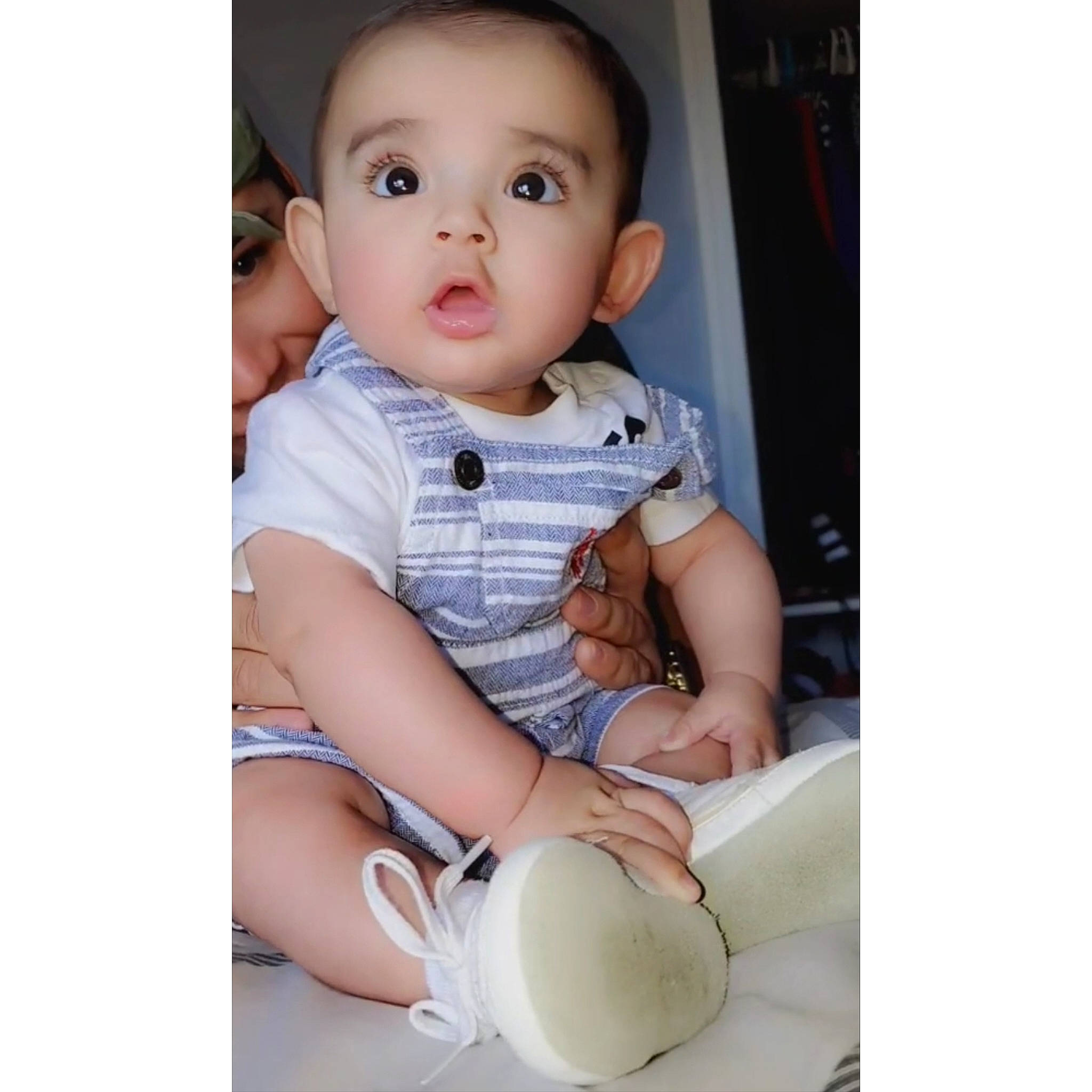 Elian joined the competition — help win amazing prizes! baby, baby_toddler_clothing, cheek, collar, comfort, dress_shirt, electric_blue, eye, eyelash, face, happy, head, human_body, human_leg, knee, neck, person, sitting, sleeve, surprise