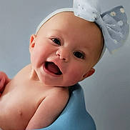 Bellomy joined the competition — help win amazing prizes! baby, infant, smile, headband, bow, child, face, happy, cute, skin, blue, seat, portrait, young, cheerful, expression, indoor, head, person, closeup