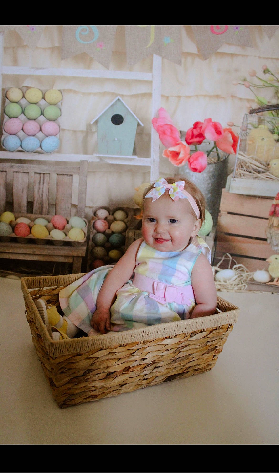 Nicole is registered to the contest to win money with this photo: baby, baby_products, baby_toddler_clothing, basket, child, event, happy, headwear, infant_bed, joy, person, picnic_basket, pink, plant, product, room, sitting, smile, storage_basket, textile