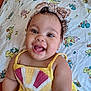 Victoria joined the competition — help win amazing prizes! baby, child, smiling, happy, headband, yellow_dress, curly_hair, blanket, cartoon_print, cute, portrait, indoors, childhood, person, infant, cheerful, closeup, sitting, skin, face