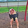 Victoria joined the competition — help win amazing prizes! baby, child, swing, playground, outdoor, grass, wood_chips, pink_hat, yellow_outfit, smiling, happy, infant, seat, metal_chain, park, daytime, cute, person, fun, play