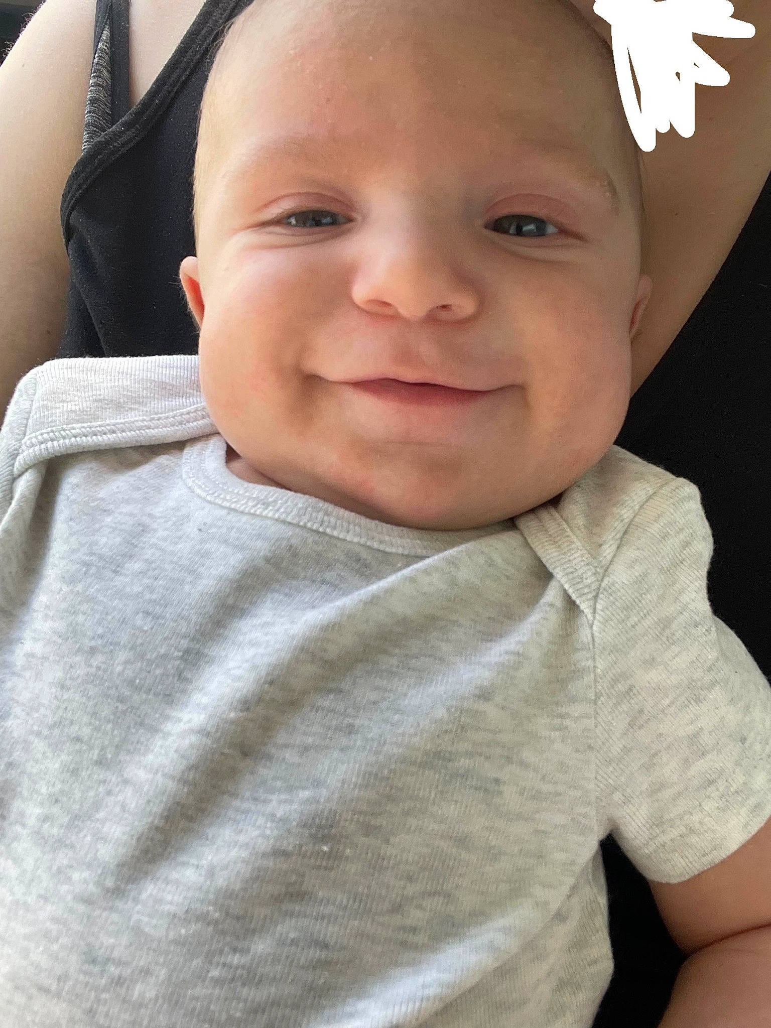 Malakai is registered to the contest to win money with this photo: baby, baby_toddler_clothing, cheek, chin, collar, eye, eyebrow, eyelash, face, hairstyle, happy, iris, joy, lip, neck, nose, person, skin, sleeve, smile