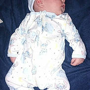 Zagreus is registered to the contest to win money with this photo: baby, bedtime, blanket, cartoon_print, child, clothing, comfort, cute, hat, indoor, infant, newborn, onesie, peaceful, person, portrait, resting, sleep, sleeping, soft
