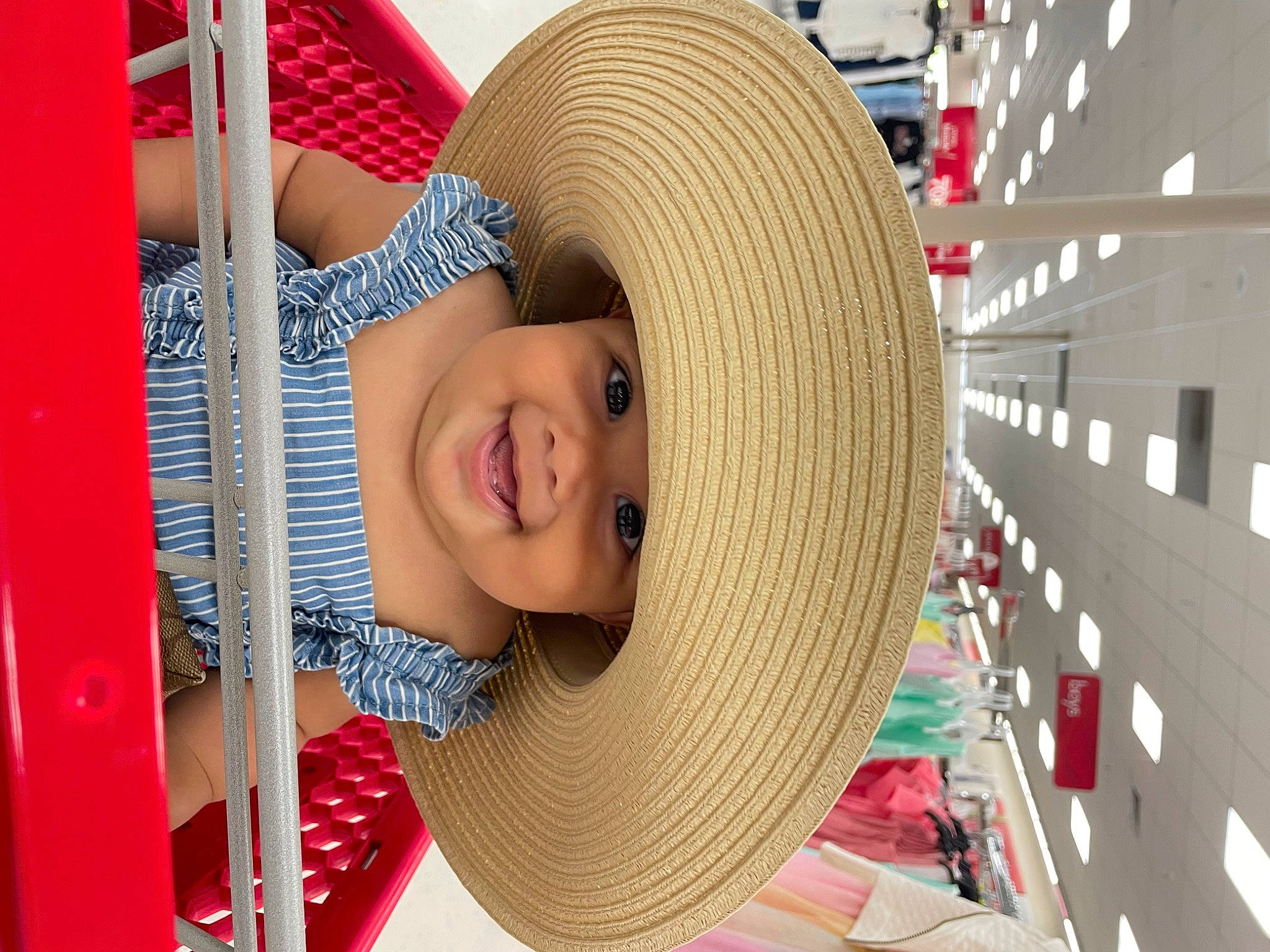 Emberly is registered to the contest to win money with this photo: automotive_wheel_system, cap, child, chin, fashion_accessory, fedora, fun, happy, hat, headwear, joy, leisure, pattern, person, product, recreation, room, smile, sun_hat, t_shirt