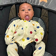 Alex joined the competition — help win amazing prizes! baby, infant, onesie, smiley_face, seat, baby_seat, straps, tongue_out, expression, indoor, toy, star_toy, ball_toy, fabric, mesh, comfort, cute, child, person, clothing