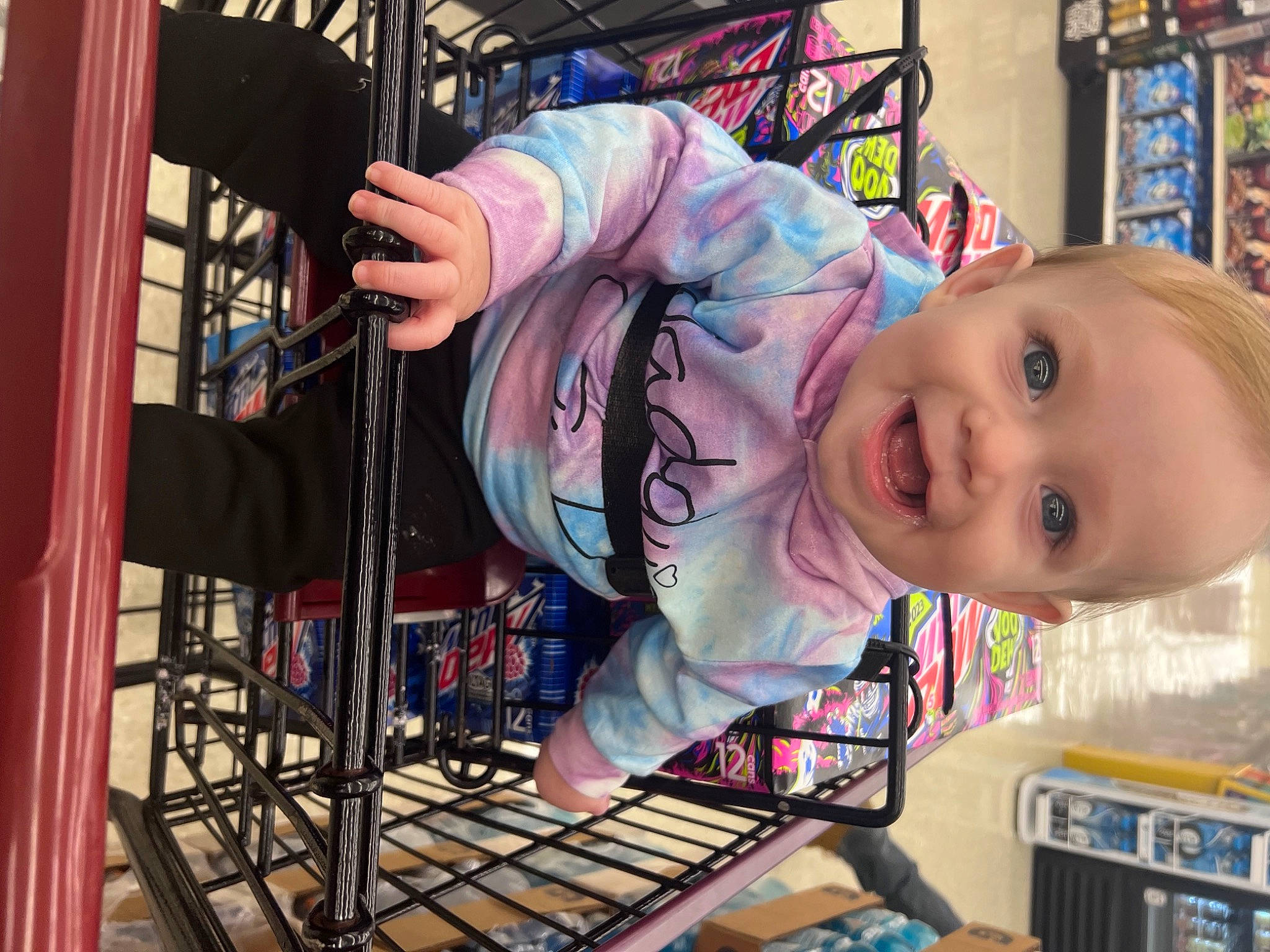 Luna is registered to the contest to win money with this photo: baby, baby_products, baby_toddler_clothing, bookcase, child, curtain, engineering, fun, joy, machine, mammal, organ, person, play, product, retail, shelf, shelving, shopping_cart, smile