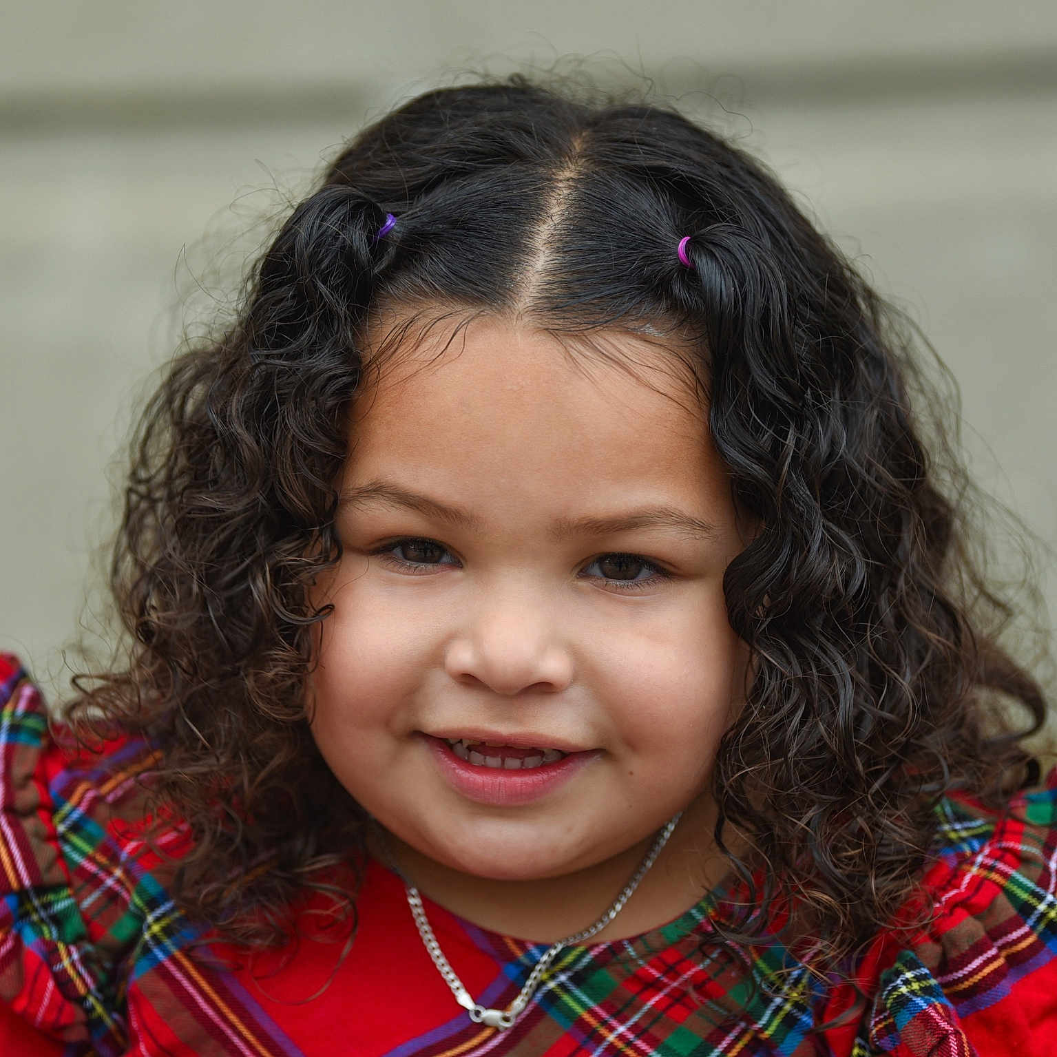 Jayleen Lao is registered to the contest to win money with this photo: accessories, bodypart, child, clothing, face, female, finger, girl, hand, happy, head, jewelry, mouth, necklace, person, photography, portrait, shoulder, smile, tartan