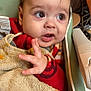 baby, bib, child, closeup, curious, cute, expression, face, feeding_time, food_stains, furniture, hand, high_chair, indoor, infant, person, portrait, red_clothing, seat, young_child