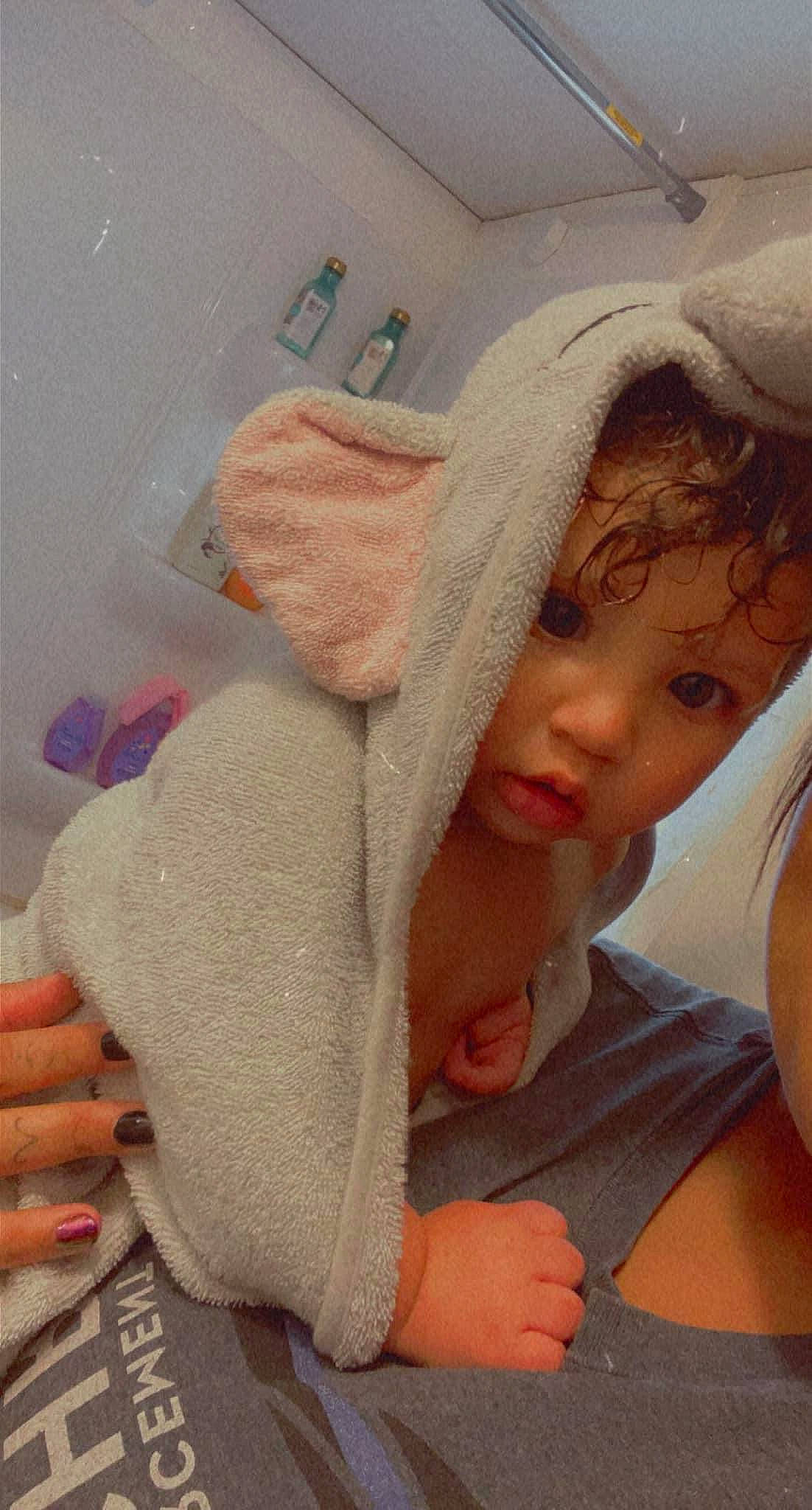 Amayah is registered to the contest to win money with this photo: baby, baby_products, baby_sleeping, bathtub, cap, child, comfort, eyebrow, fashion_accessory, finger, headgear, linens, lip, mouth, nail, person, room, skin, textile, thumb