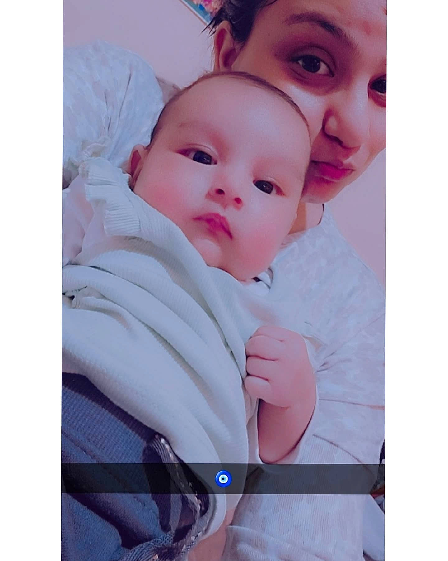 Ira is registered to the contest to win money with this photo: baby, baby_products, baby_sleeping, baby_toddler_clothing, bag, child, comfort, electric_blue, eye, eyelash, gesture, happy, linens, love, magenta, nose, person, selfie, sitting, sleeve