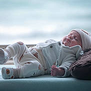 Wyatt participe au concours pour gagner de l'argent avec cette photo : baby, blanket, child, closeup, cozy_clothing, cute, cute_outfit, hat, indoors, infant, newborn, peaceful, pillow, portrait, relaxation, resting, sleeping, smile, soft_surface, warm