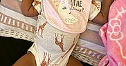 Laelani joined the competition — help win amazing prizes! baby, sleeping, onesie, bib, giraffe_pattern, pillow, blanket, sock, infant, child, rest, cute, cozy, face, hand, footwear, fabric, bed, pattern, peaceful