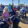 Alexa joined the competition — help win amazing prizes! biker, biker_rally, blue_sky, boots, child, chrome, crowd, dress, festival, girl, helmet, motorbike, motorcycle, outdoor, parking_lot, pink, portrait, sunglasses, sunny, vehicle