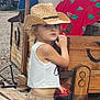 Alexa joined the competition — help win amazing prizes! adult, cap, car, child, clothing, face, female, girl, hat, head, machine, person, photography, portrait, shorts, skirt, sunhat, transportation, wheel, woman