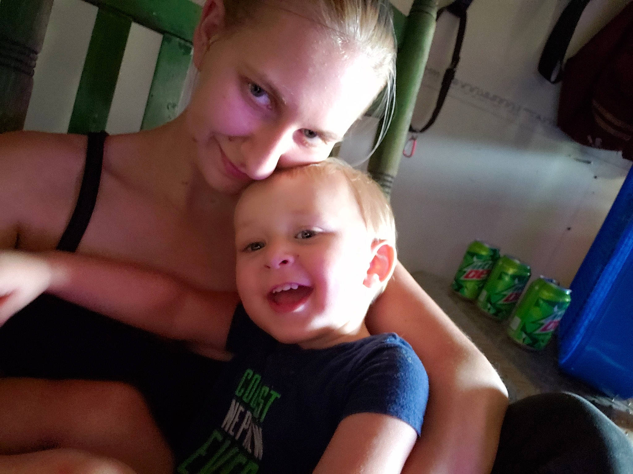 Aiden is registered to the contest to win money with this photo: arm, baby, cheek, child, chin, eye, face, facial_expression, finger, fun, hand, head, male, mouth, nose, organ, person, skin, smile, summer