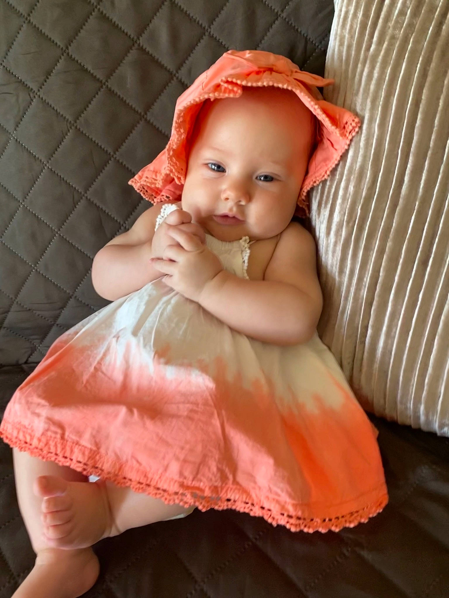 Zena joined the competition — help win amazing prizes! baby, baby_toddler_clothing, blond, cap, cheek, costume_hat, day_dress, dress, eye, hat, headgear, iris, lip, pattern, peach, person, pink, ruffle, skin, sun_hat