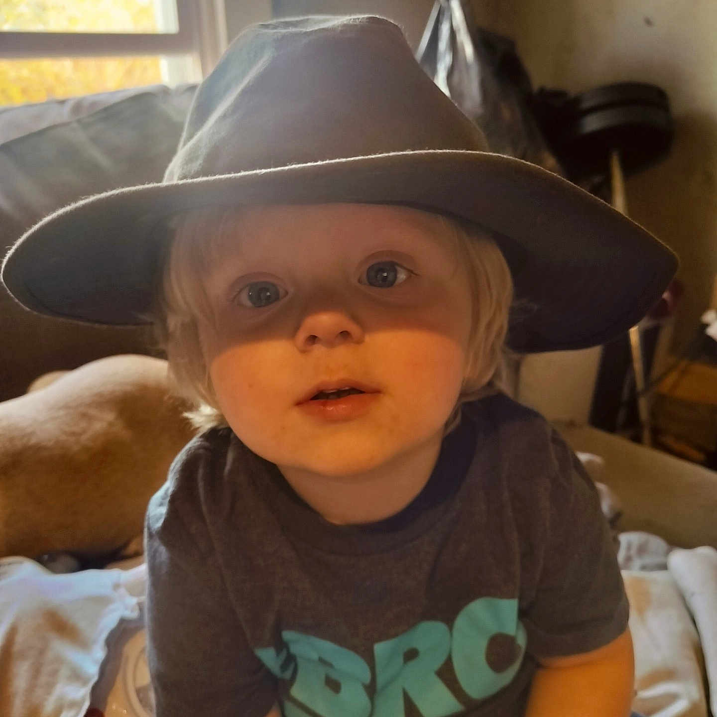 Julian joined the competition — help win amazing prizes! baby, bed, bedroom, cap, clothing, couch, cowboyhat, face, furniture, hat, head, homedecor, indoors, pants, person, photography, portrait, room, sunhat, t_shirt