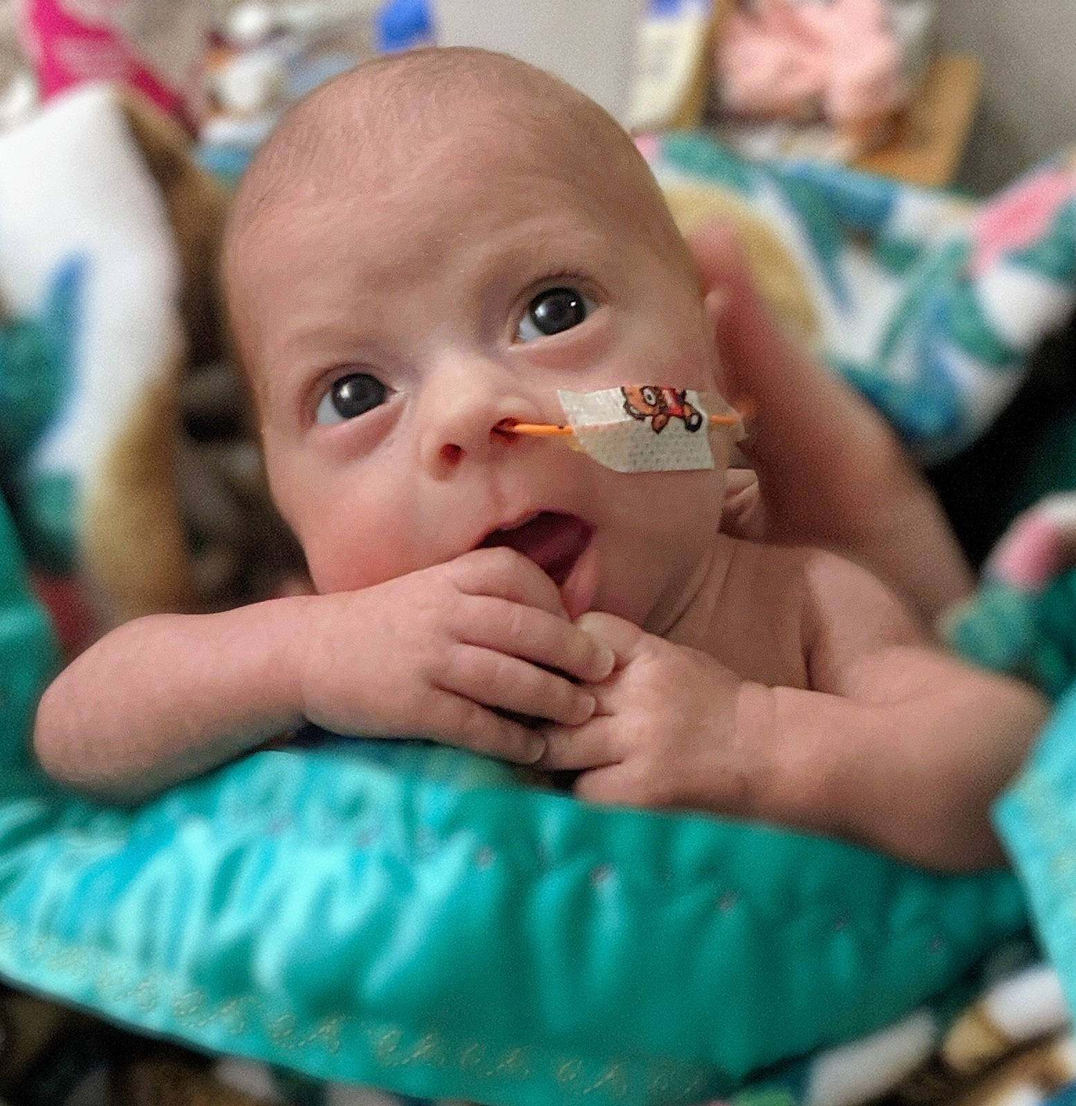 Maelynn is registered to the contest to win money with this photo: baby, baby_products, baby_toddler_clothing, blue, cheek, child, comfort, ear, eyebrow, eyelash, finger, fun, gesture, happy, leisure, nail, nose, person, skin, thumb