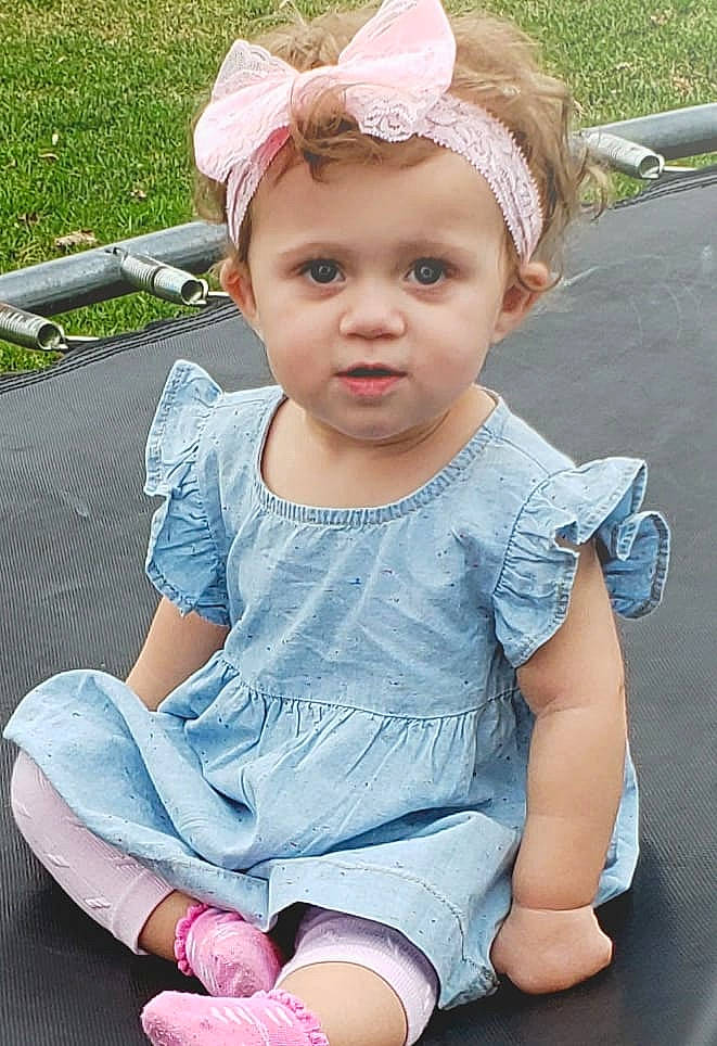 Leena joined the competition — help win amazing prizes! baby, baby_products, baby_toddler_clothing, child, child_model, hair_accessory, headgear, person, pink, product, sitting, toddler