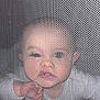 Swann participe au concours pour gagner de l'argent avec cette photo : baby, baby_face, baby_gear, cage, child, closeup, curious, expression, face, hand, indoor, infant, looking, mesh, netting, playpen, portrait, soft_lighting, white_clothing, young_child