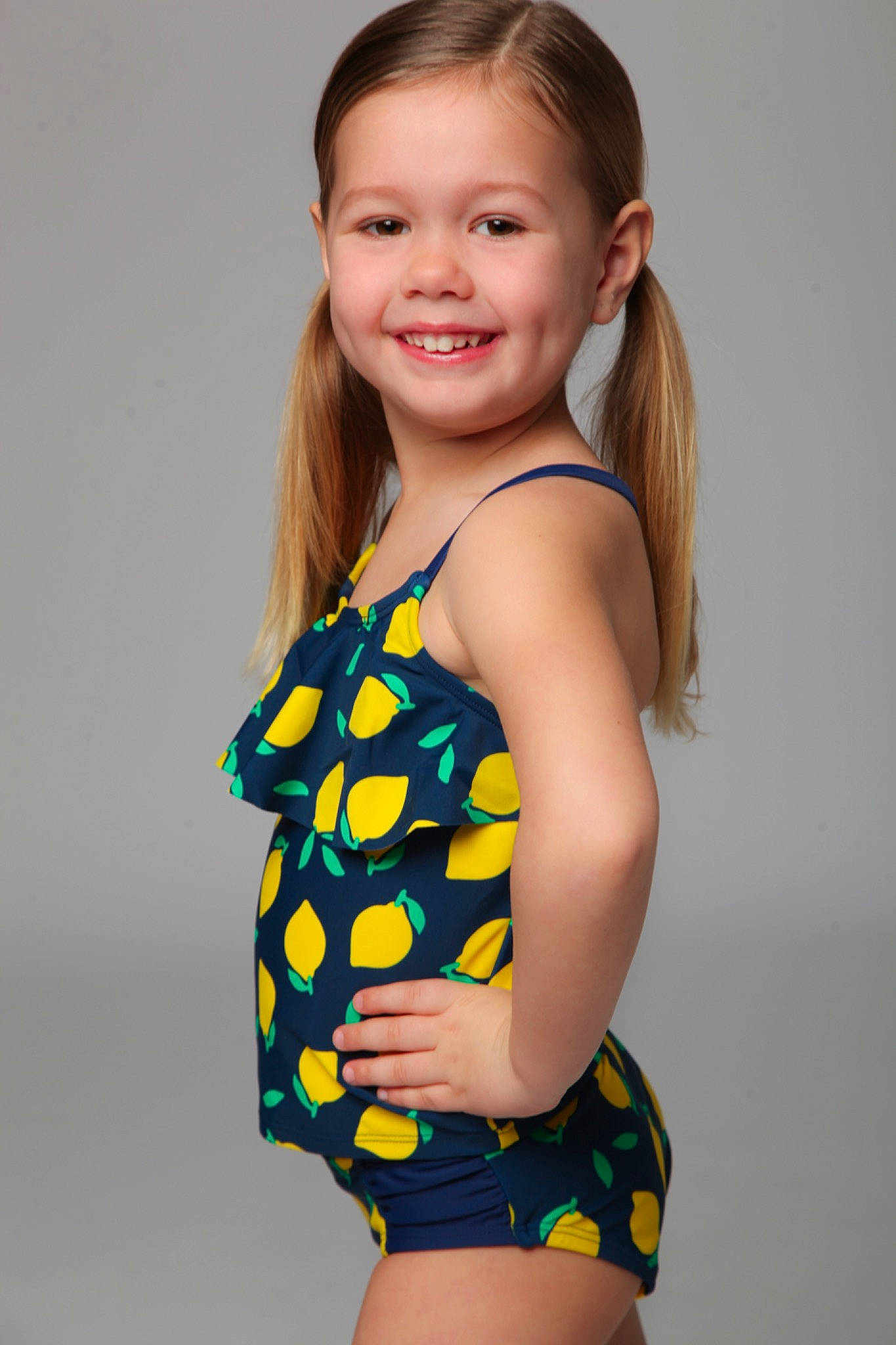 Charlotte is registered to the contest to win money with this photo: arm, black_hair, face, flash_photography, hair, happy, head, human_body, joint, joy, lingerie_top, neck, one_piece_garment, one_piece_swimsuit, person, shoulder, sleeve, smile, swimwear, thigh