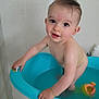 Nathanaël a rejoint le concours — aidez-le/la à gagner de superbes lots ! baby, bathtub, water, toy, toddler, bathroom, child, skin, hand, face, expression, standing, blue, white, floor, tile, smile, cute, playful, indoor