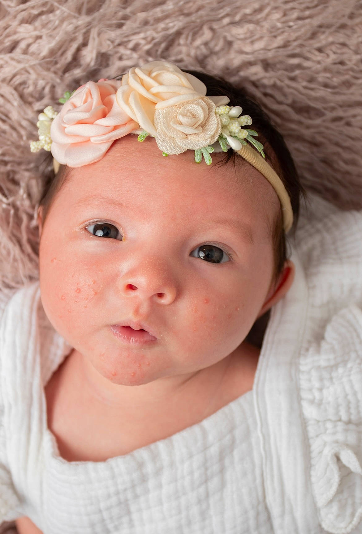 Estella joined the competition — help win amazing prizes! baby, baby_toddler_clothing, cheek, chin, eye, eyebrow, eyelash, face, flower, head, headband, headgear, headpiece, headwear, iris, lip, person, petal, pink, skin