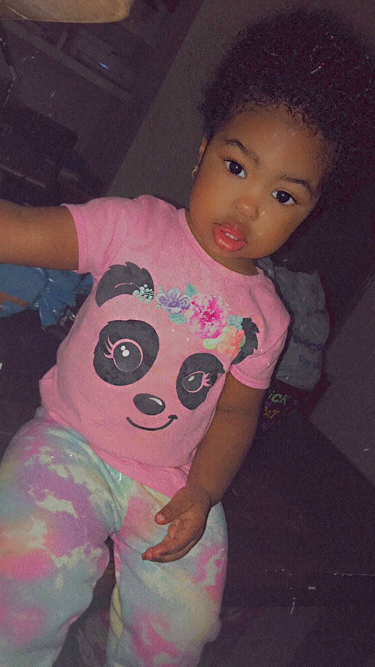 Aubrielle is registered to the contest to win money with this photo: afro, baby, baby_products, baby_toddler_clothing, cheek, child, cool, eye, human_body, jheri_curl, joint, nightwear, overall, pajamas, person, pink, s_curl, sleeve, toddler