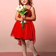 Rosa Nikol joined the competition — help win amazing prizes! child, girl, red_dress, crown, flowers, white_tulips, standing, portrait, smiling, curly_hair, stockings, red_shoes, pose, studio, pink_background, happy, cute, fashion, young, innocent