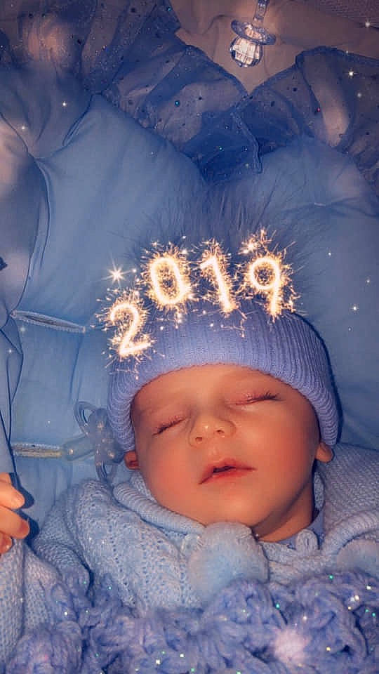 Alfie Stephen is registered to the contest to win money with this photo: beauty, blue, cheek, child, close_up, eye, face, forehead, freezing, fun, girl, hair_accessory, head, human, infant, nose, person, skin, smile, toddler