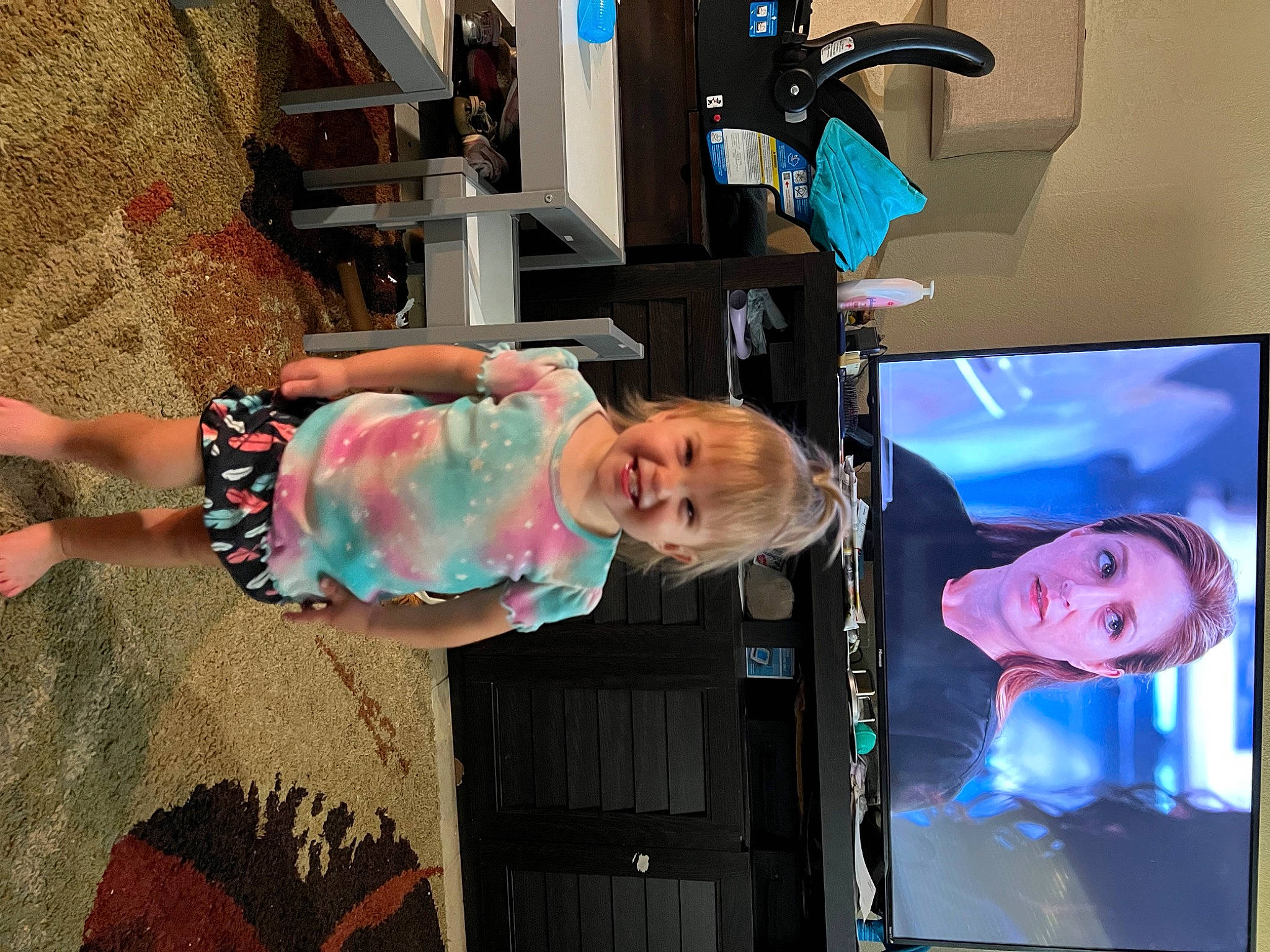 Allison joined the competition — help win amazing prizes! advertising, blue, display_device, entertainment, event, flat_panel_display, fun, human_leg, joy, led_backlit_lcd_display, machine, magenta, microphone, multimedia, person, projection_screen, room, suit, television, television_set