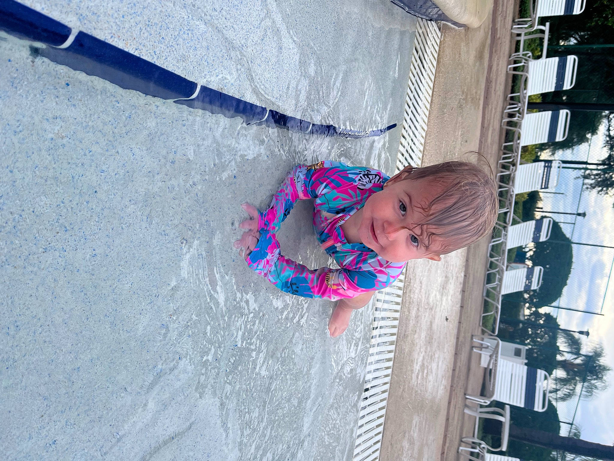 Allison joined the competition — help win amazing prizes! asphalt, boat, building, city, concrete, electric_blue, facade, fun, leisure, pattern, person, recreation, road_surface, sidewalk, smile, toddler, water, winter