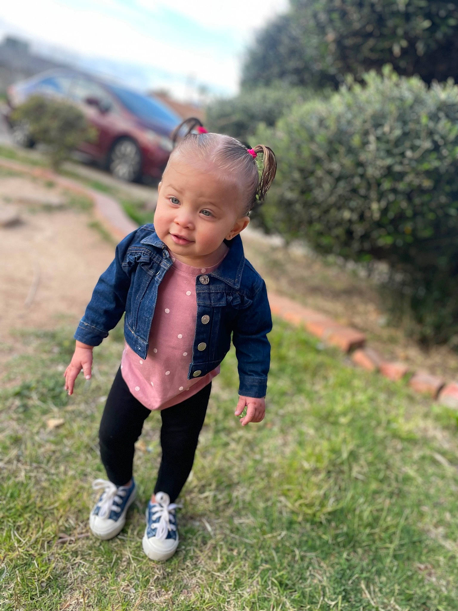 Malayah is registered to the contest to win money with this photo: baby, baby_toddler_clothing, car, child, fun, gesture, grass, grass_family, grassland, happy, landscape, leisure, meadow, people_in_nature, person, plant, recreation, sky, smile, toddler