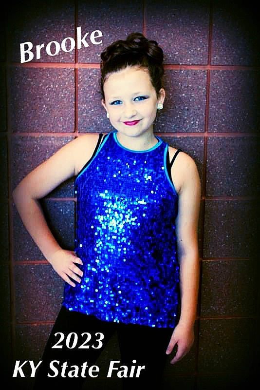 Brooke joined the competition — help win amazing prizes! chest, cocktail_dress, darkness, day_dress, electric_blue, entertainment, event, fashion_accessory, fashion_design, fashion_model, flash_photography, formal_wear, jewellery, joy, one_piece_garment, pattern, person, smile, thigh, trunk