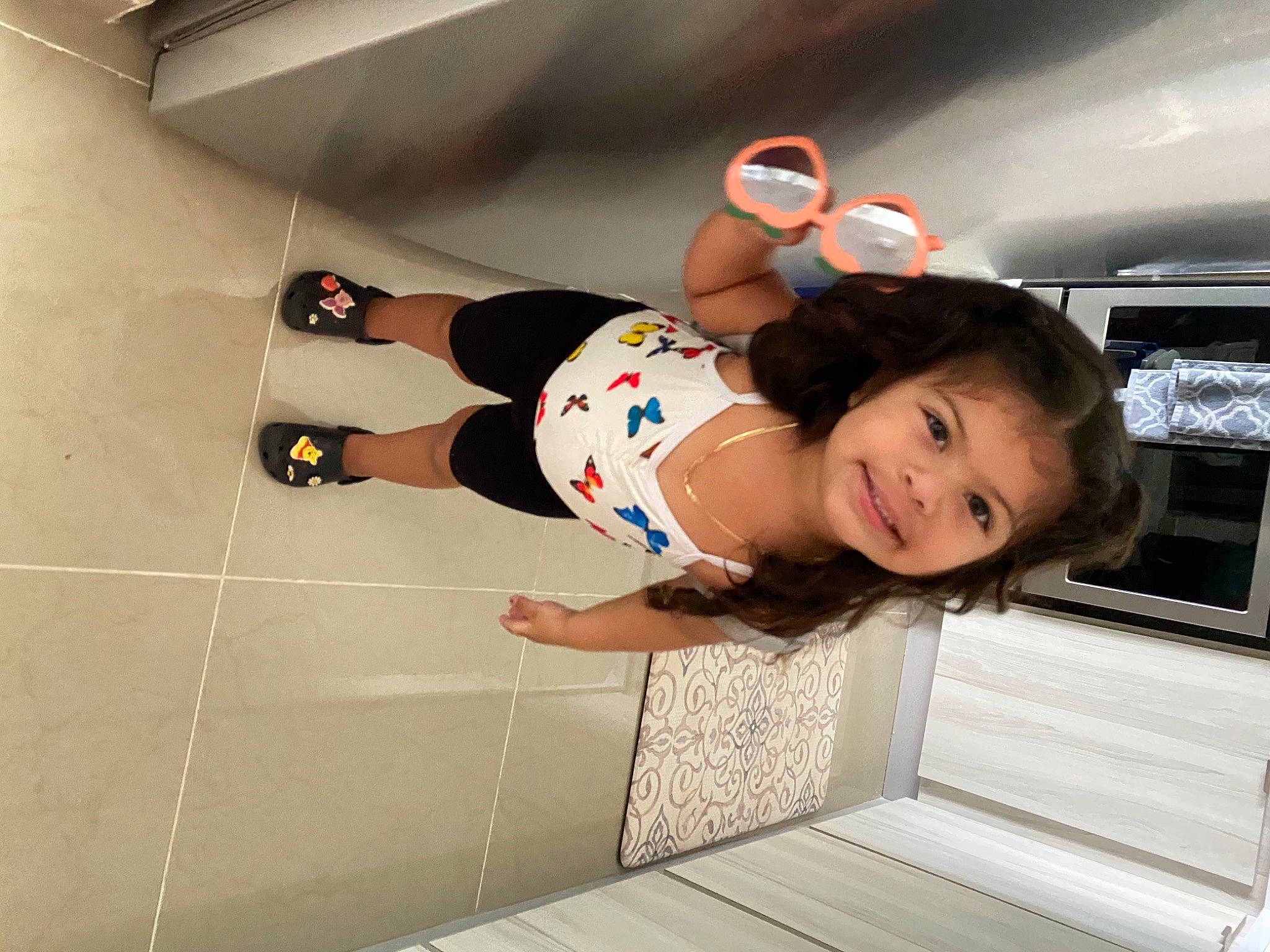 Alianna joined the competition — help win amazing prizes! automotive_design, automotive_exterior, calf, elbow, flooring, foot, fun, human_leg, joy, knee, leisure, person, recreation, room, sandal, smile, sneakers, sportswear, street_fashion, thigh