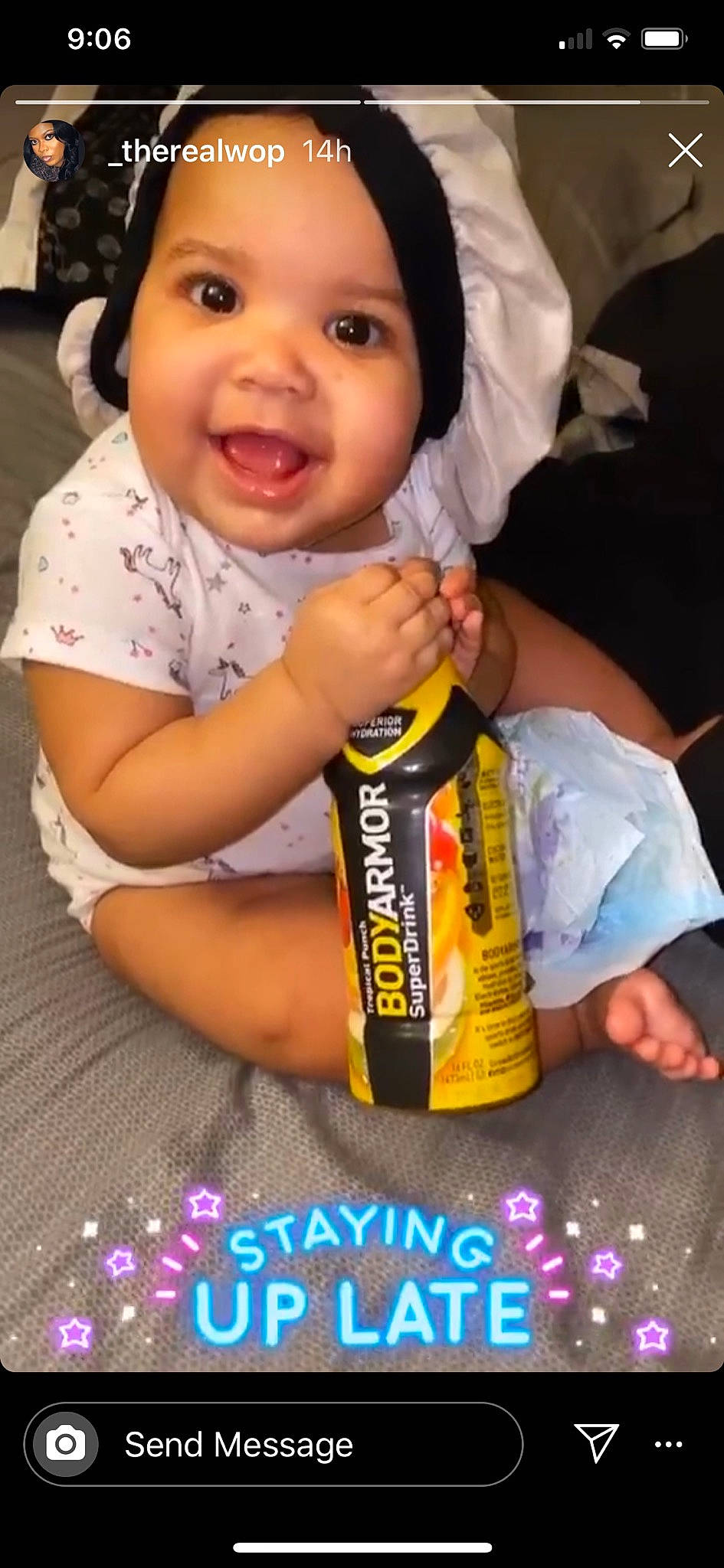 Denim is registered to the contest to win money with this photo: baby, bottle, cheek, child, cool, drink, drinkware, facial_expression, happy, headwear, nose, person, photo_caption, play, product, smile, t_shirt, toddler