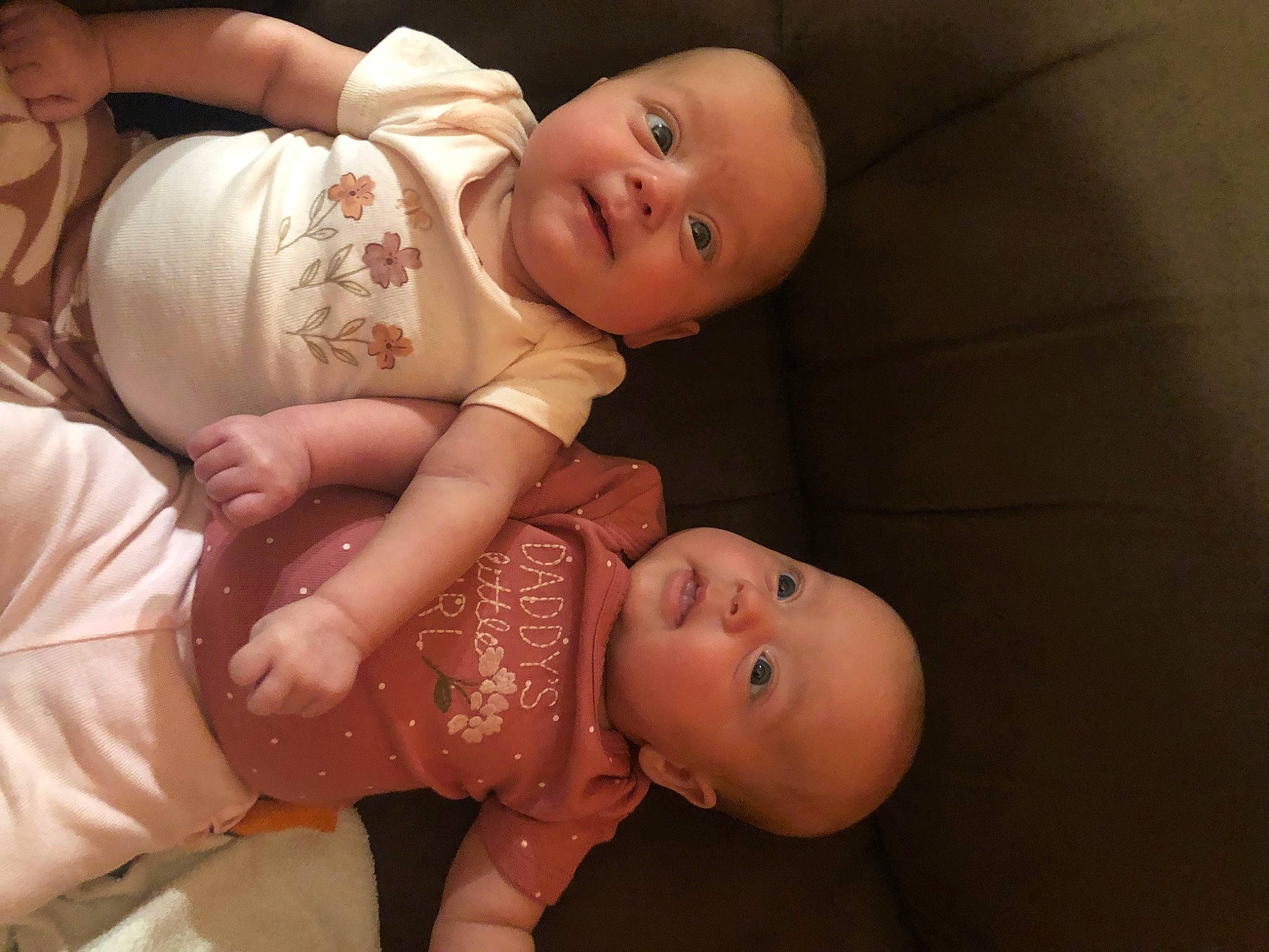 Dunnic Twins is registered to the contest to win money with this photo: arm, baby, baby_toddler_clothing, cheek, comfort, eye, finger, flash_photography, gesture, hand, happy, head, human_body, iris, mouth, nose, organ, person, skin, smile