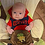 Ryker joined the competition — help win amazing prizes! baby, infant, child, person, clothing, red_hoodie, levi's, disney, baby_seat, seat_belt, plush, indoor, cute, sitting, face, blue_eyes, soft_toy, comfort, young_child, portrait