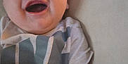 Ryker is registered to the contest to win money with this photo: baby, smiling, infant, happy, face, pillow, plaid, blanket, clothing, person, child, indoors, cute, young, skin, head, toddler, expression, lying, joyful