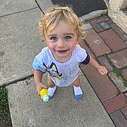 Atom joined the competition — help win amazing prizes! toddler, child, blonde_hair, blue_eyes, smiling, outdoor, sidewalk, chalk, toy, socks, short_sleeve_shirt, curly_hair, happy, person, concrete, brick_path, door_mat, playful, daylight, casual_clothing