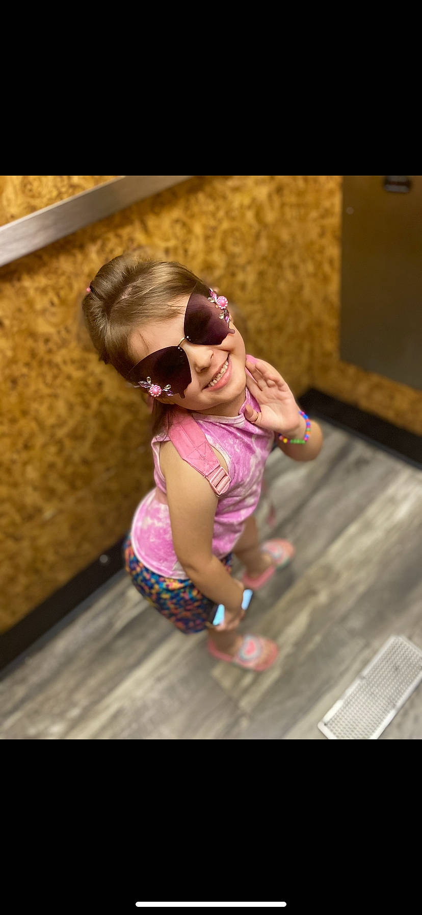 Raelyn joined the competition — help win amazing prizes! child, entertainment, event, eyewear, flooring, fun, glasses, goggles, happy, joy, leisure, magenta, person, personal_protective_equipment, pink, recreation, room, smile, sunglasses, toddler