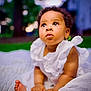Elaya is registered to the contest to win money with this photo: baby, child, outdoor, white_dress, blanket, grass, curious, portrait, bokeh, hands, feet, infant, sitting, cute, skin, nature, daylight, expression, young, person