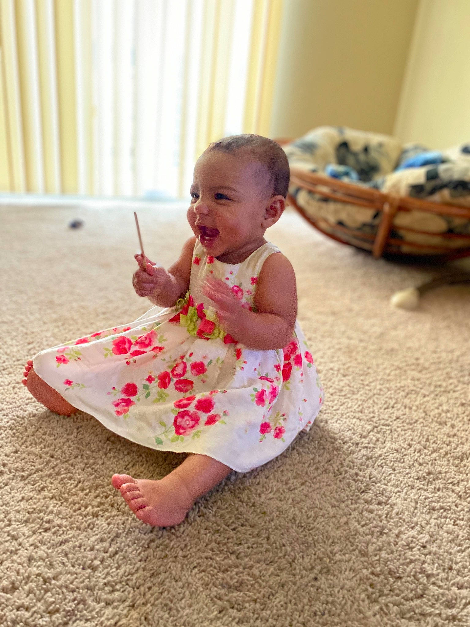 Kyrah is registered to the contest to win money with this photo: baby, child, dress, floor, flooring, fun, happy, head, person, pink, play, room, sitting, skin, smile, summer, toddler, vacation