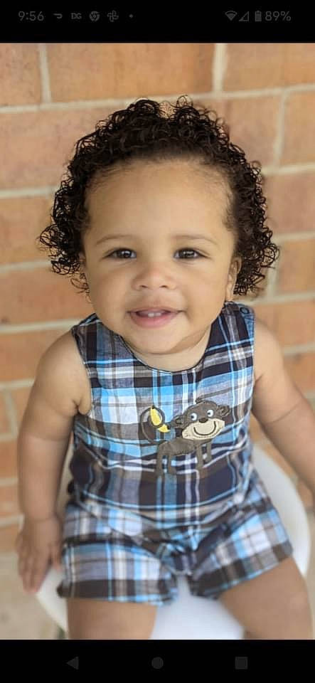 Isaiah is registered to the contest to win money with this photo: cheek, chin, collar, eye, eyelash, face, flash_photography, hair, happy, head, iris, joy, lip, nose, person, plaid, skin, sleeve, smile, tartan